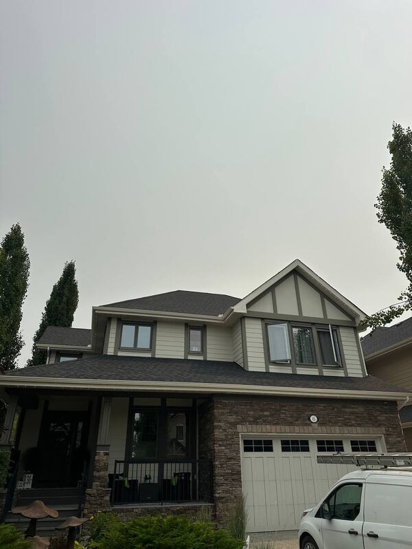 Permanent lighting install on a stone-front Calgary home